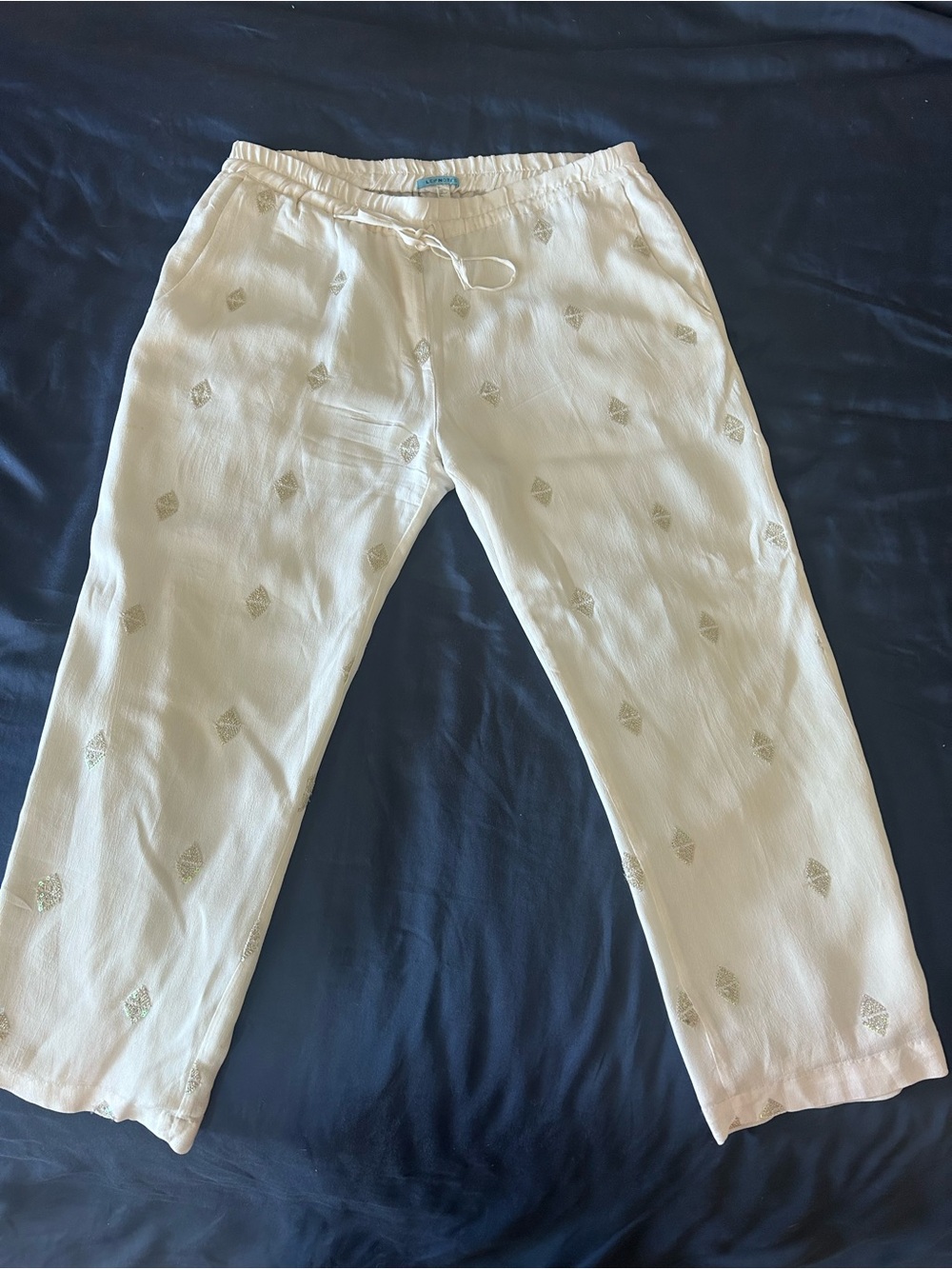 Women's Cream Cropped Drawstring Pants with Subtle Embroidered Motifs